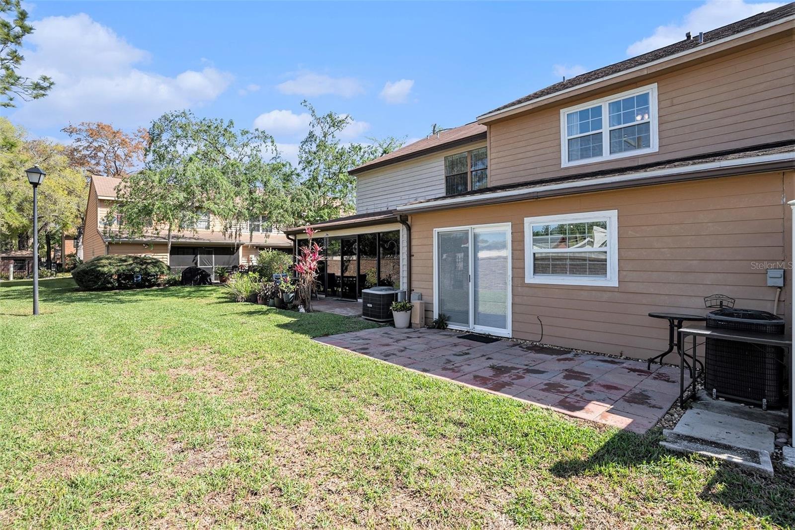 Backyard features a 6' pavered patio for grilling and enjoying the Florida sun