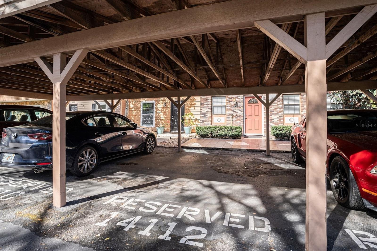 The unit comes with 2 assigned spots including this covered spot.