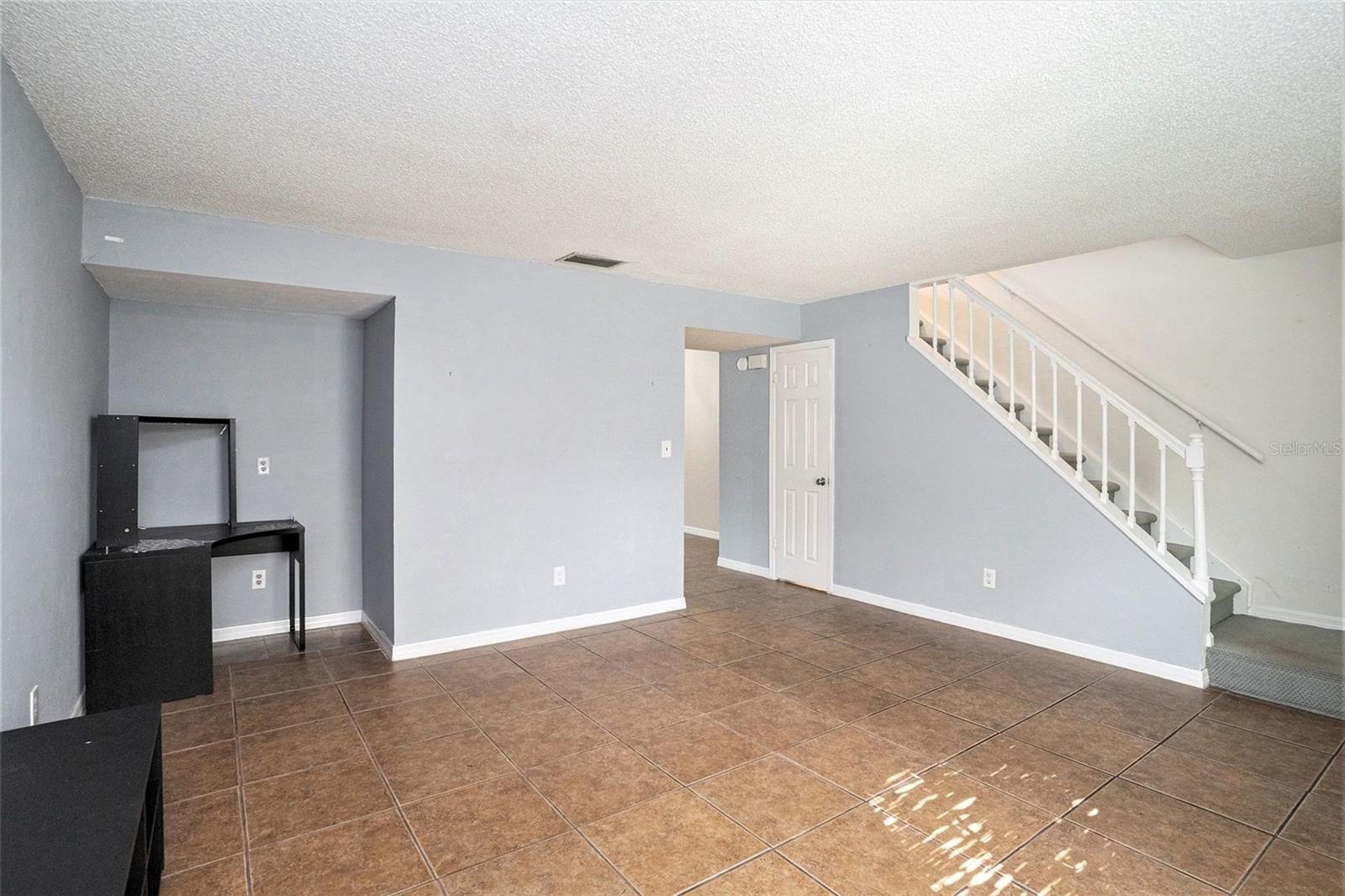 Recessed area large enough for a desk or even a bar area in the living room!