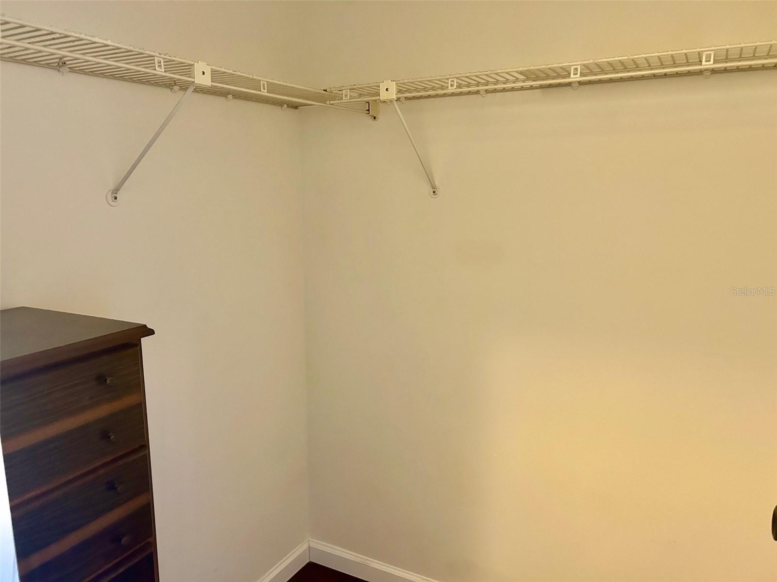 Walk In Closet In Primary Bedroom