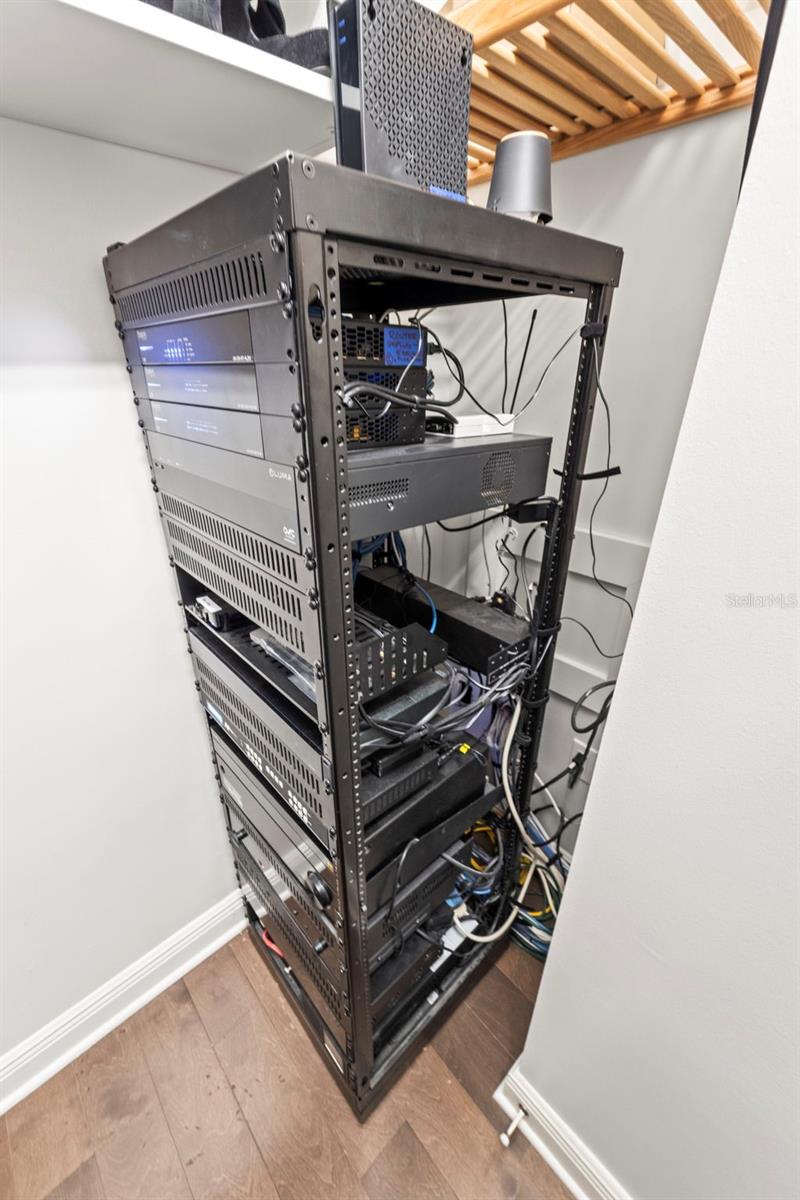 Central AV stack supporting the home's integrated audio, media, and smart home capabilities.