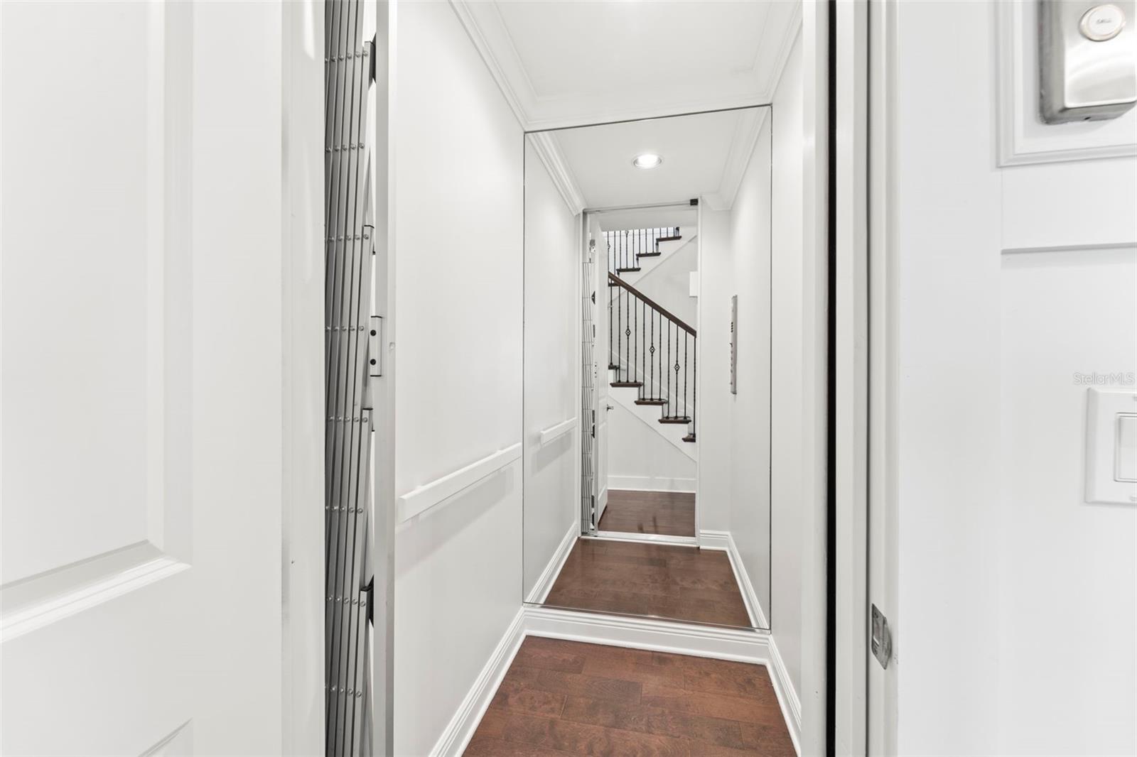 Peeking into the elevator.