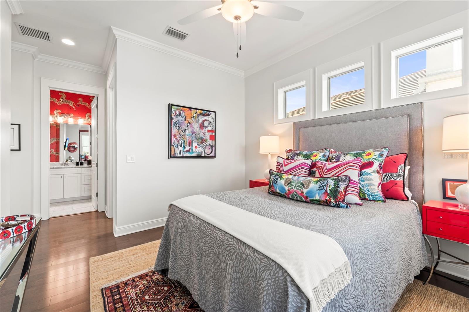 Additional view of bedroom 2 facing the ensuite bathroom door.