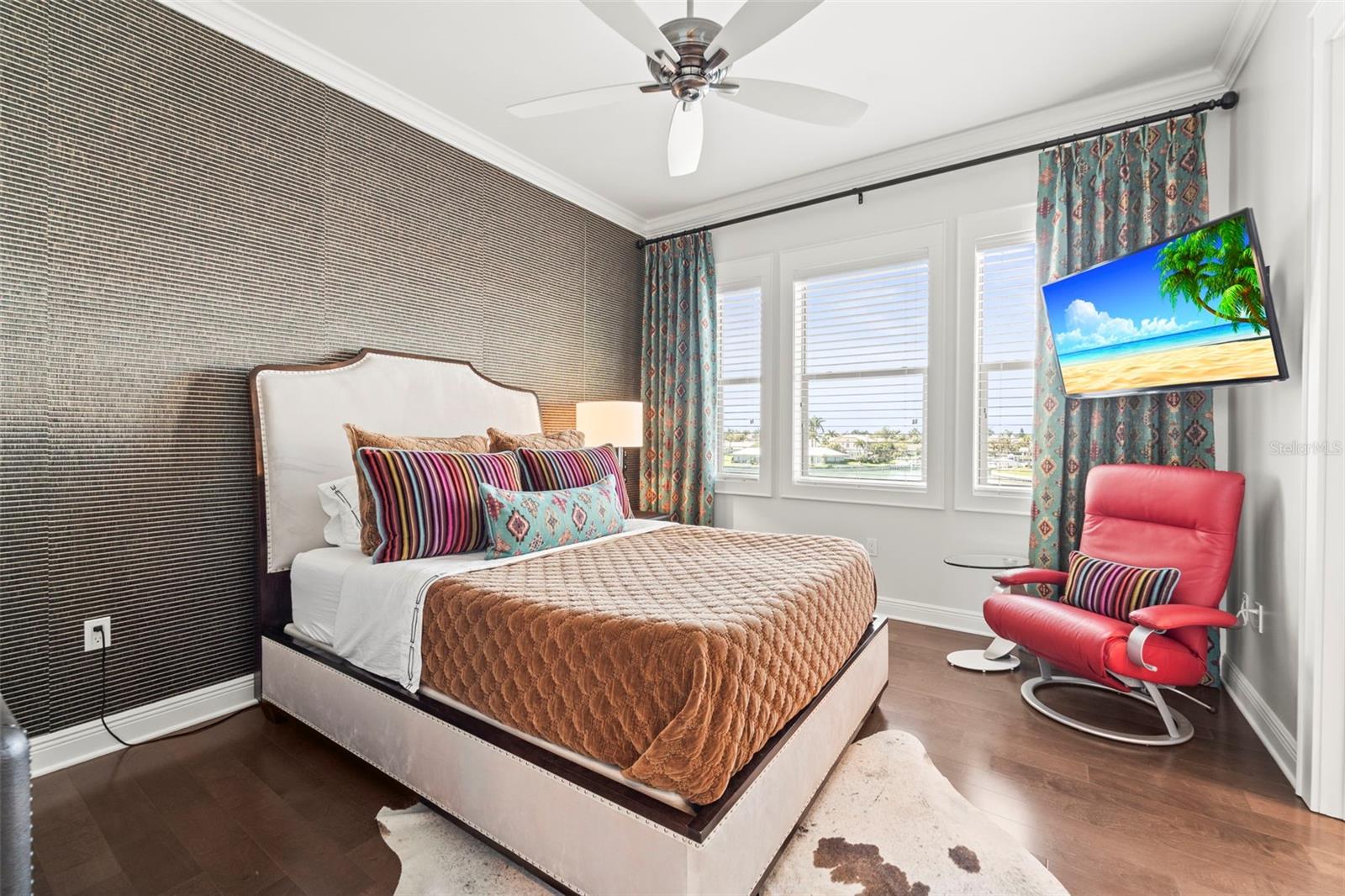 Bedroom 3 with beautiful water views and access to a shared Jack-and-Jill bath.