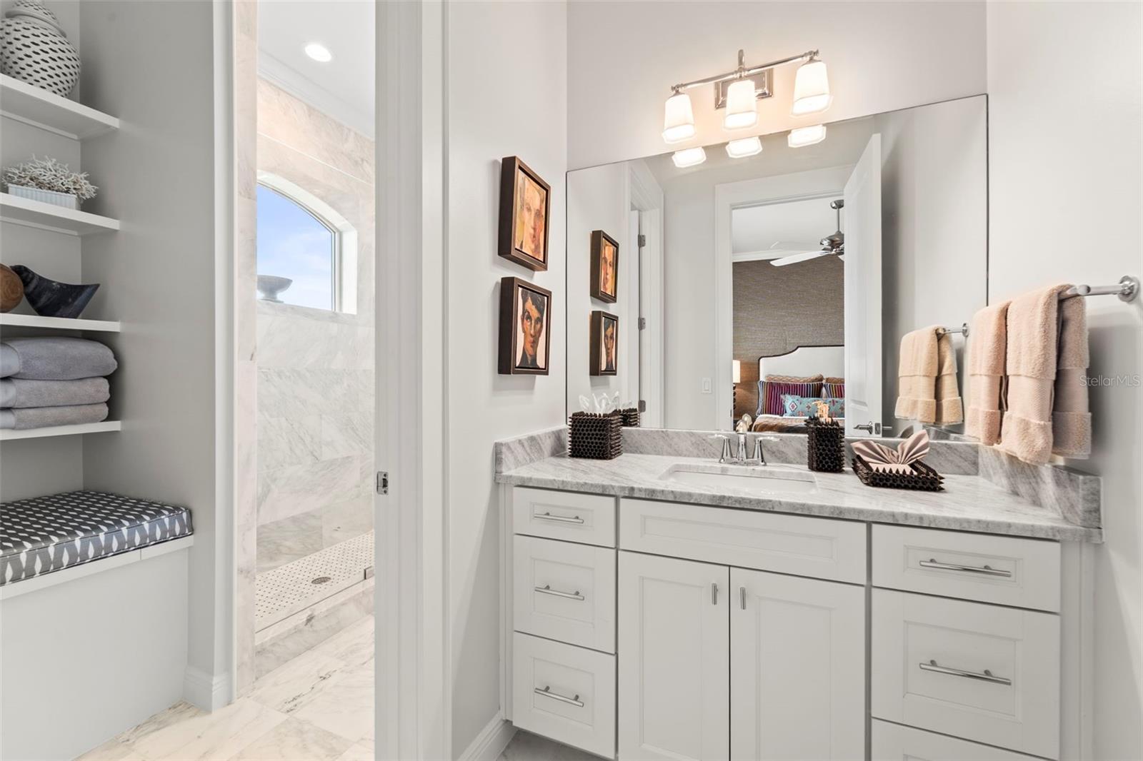 Private vanity area for bedroom 3 within the Jack-and-Jill bathroom shared with bedroom 4.