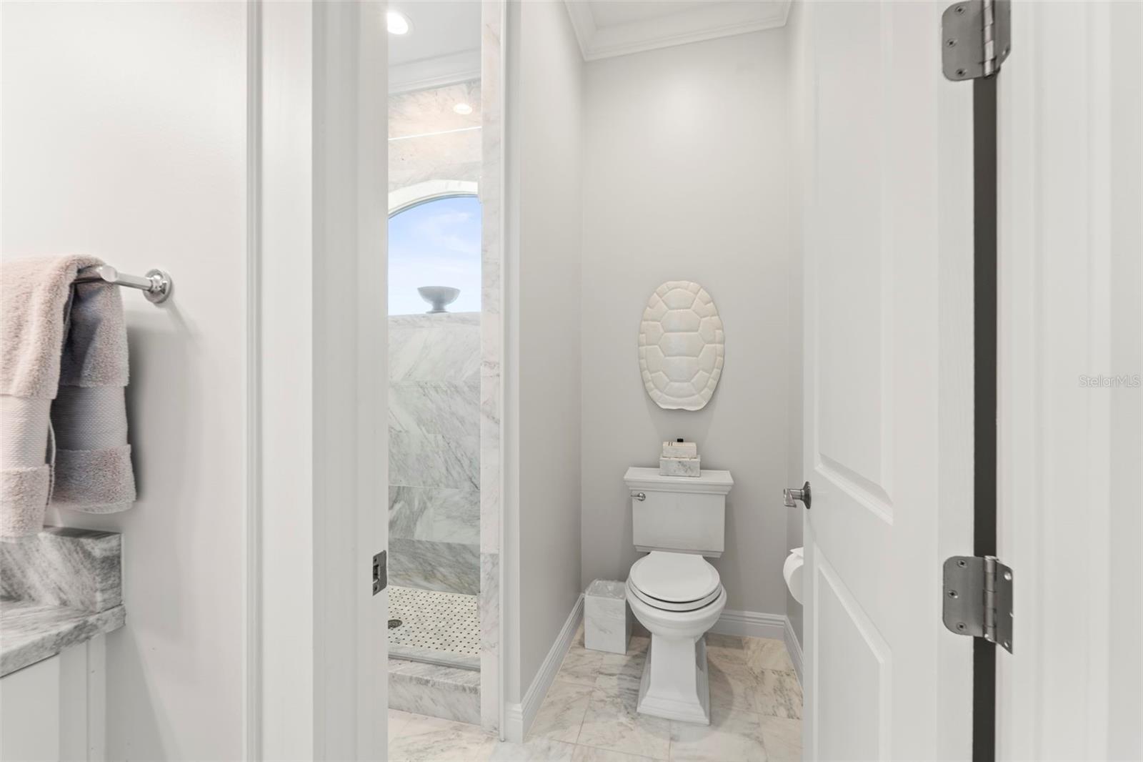 Additional view of shared Jack-and-Jill bath from bedroom 4's private vanity area.