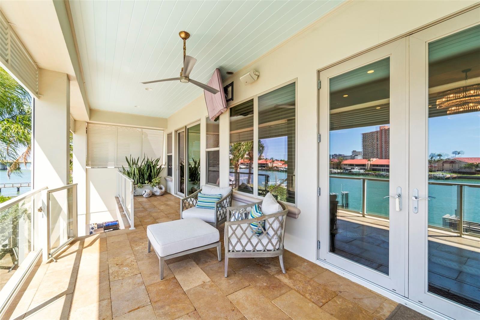 Second floor lanai with private access from the primary suite with stunning waterfront views.