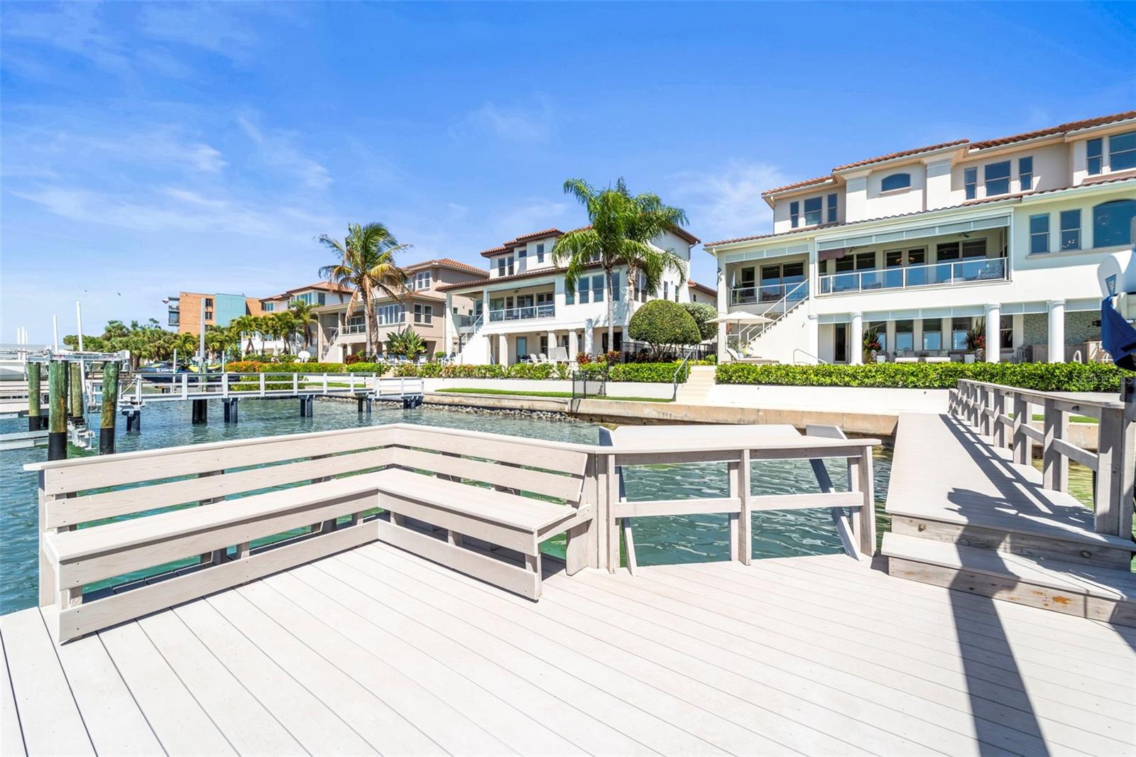 Convenient trex dock and seating, fish cleaning & prep station with attached aluminum ladder to water access