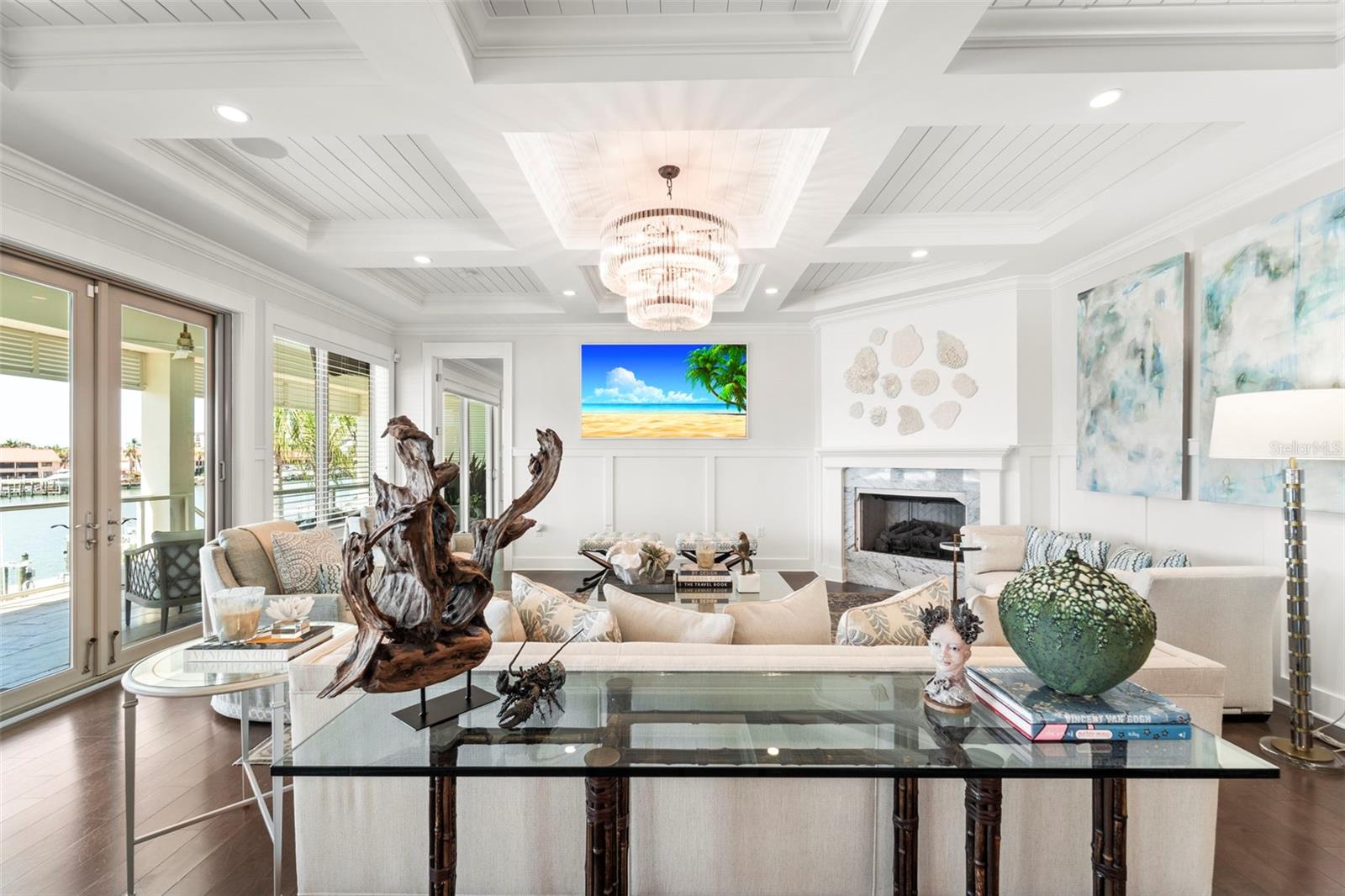 View of the living room looking towards the primary suite doorway