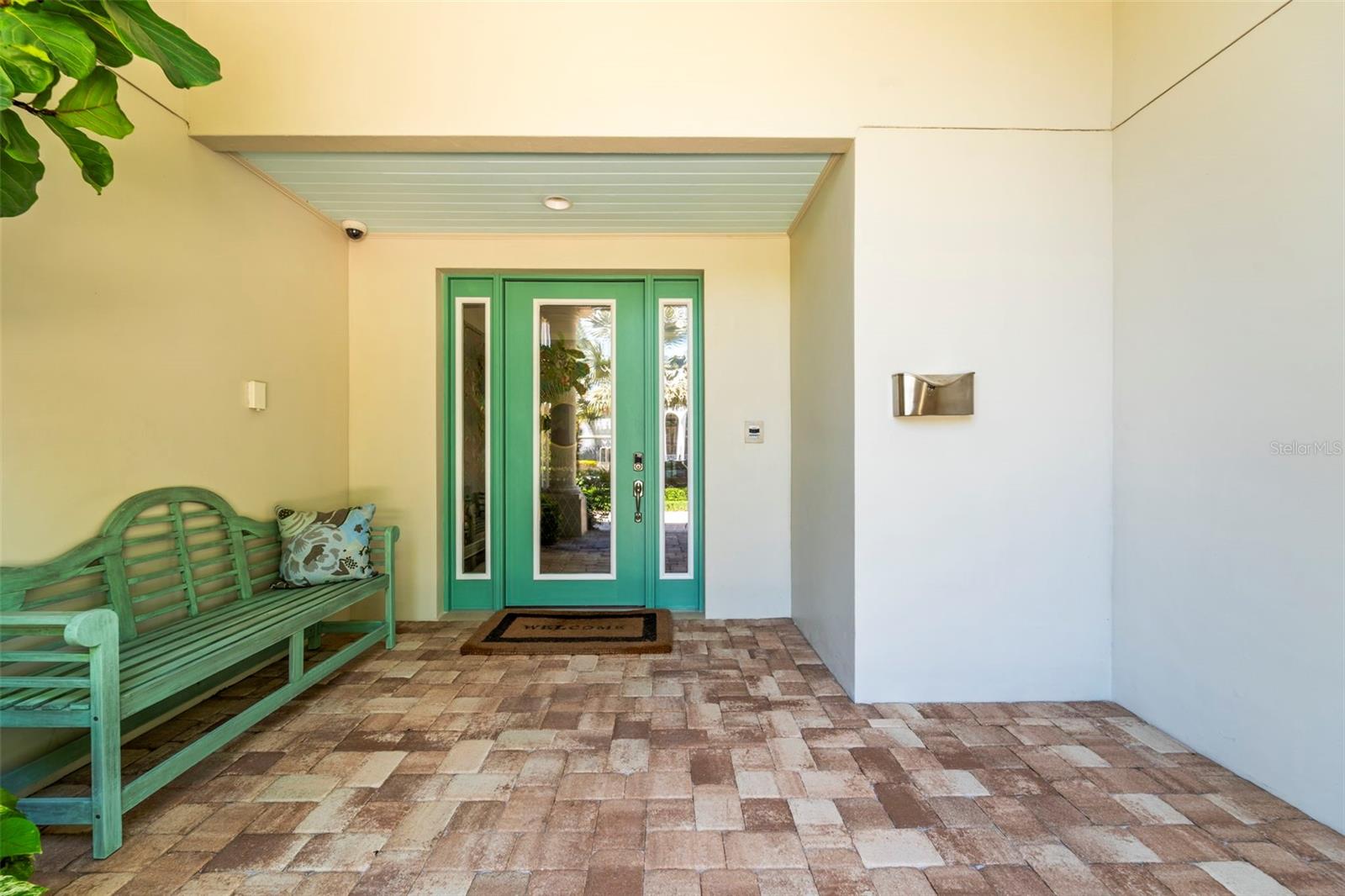 Welcoming front entrance with covered porch.