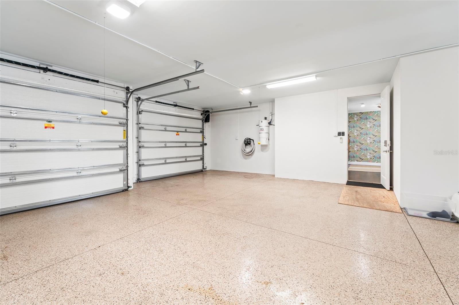 Spacious garage with space for up to five vehicles.