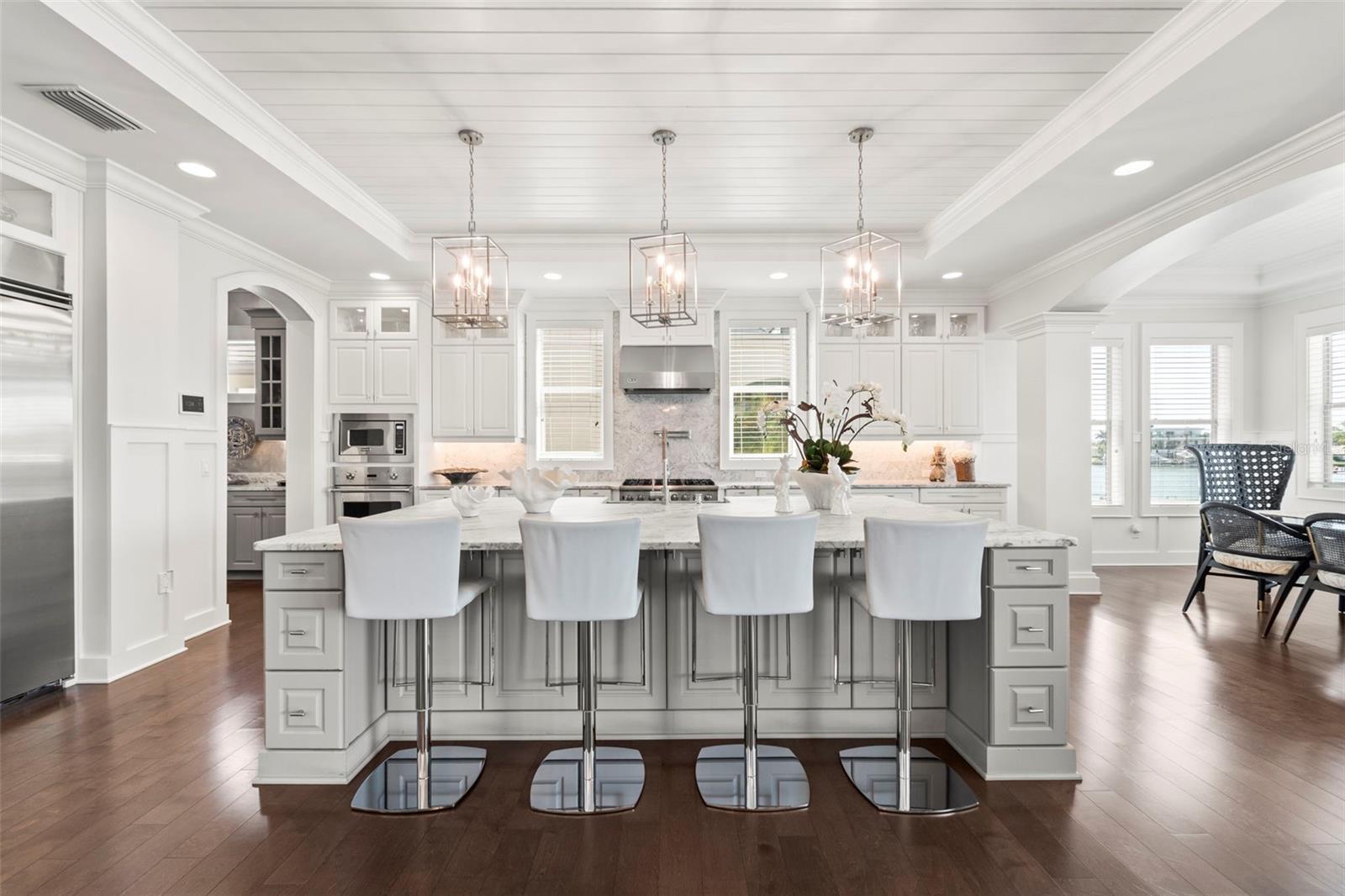Oversized kitchen with island bar seating, Viking appliances, dual ovens, wine cooler & tons of storage - perfect for entertaining