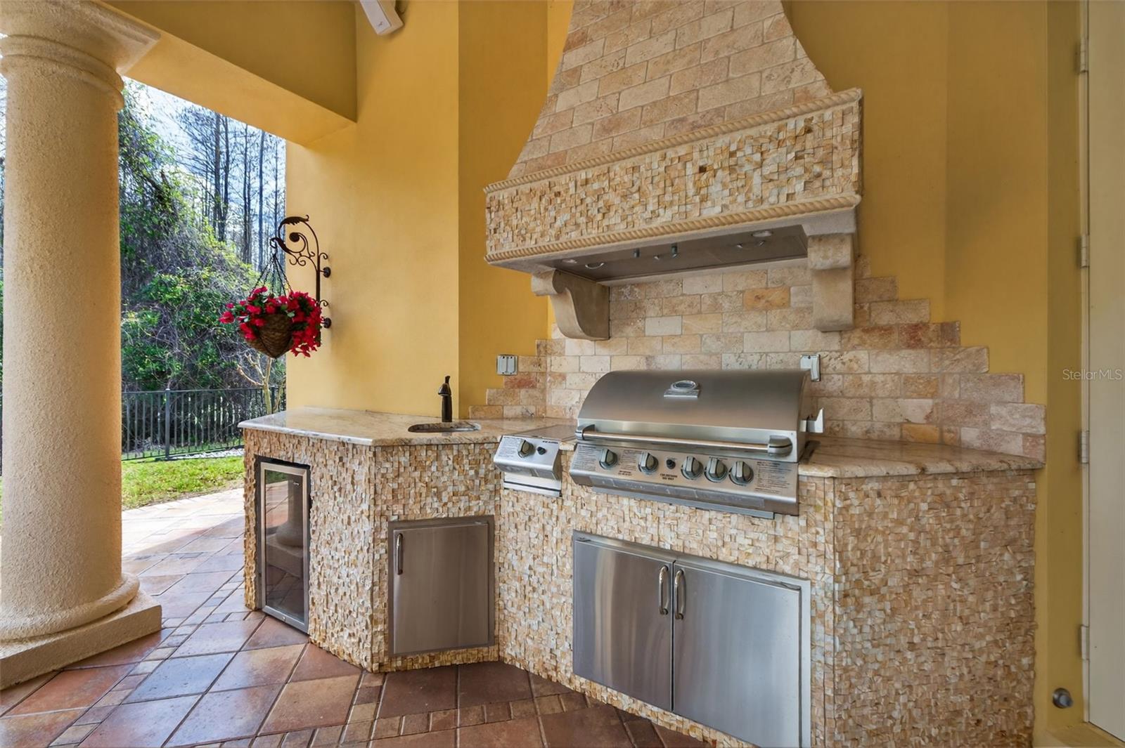 Outdoor kitchen with gas grill