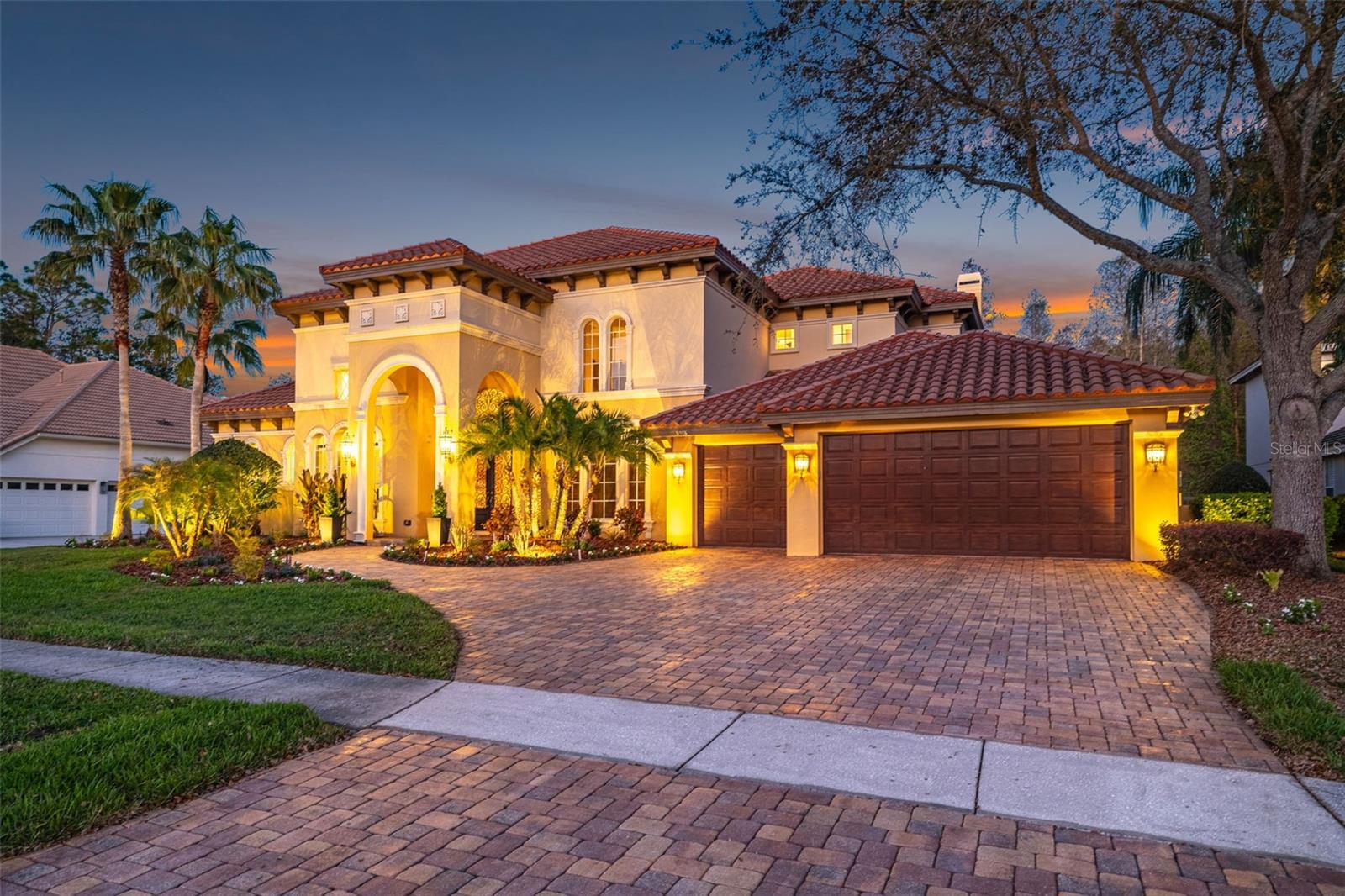 Brick paved driveway freshly sealed