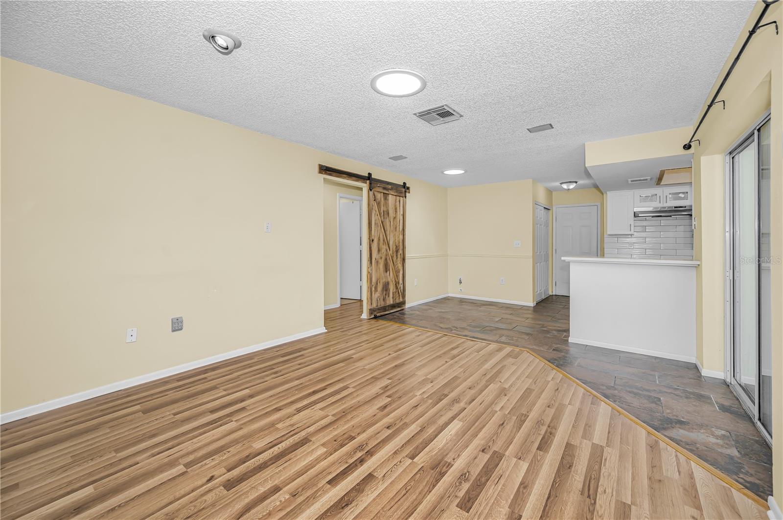 Family room looking back to kitchen nook