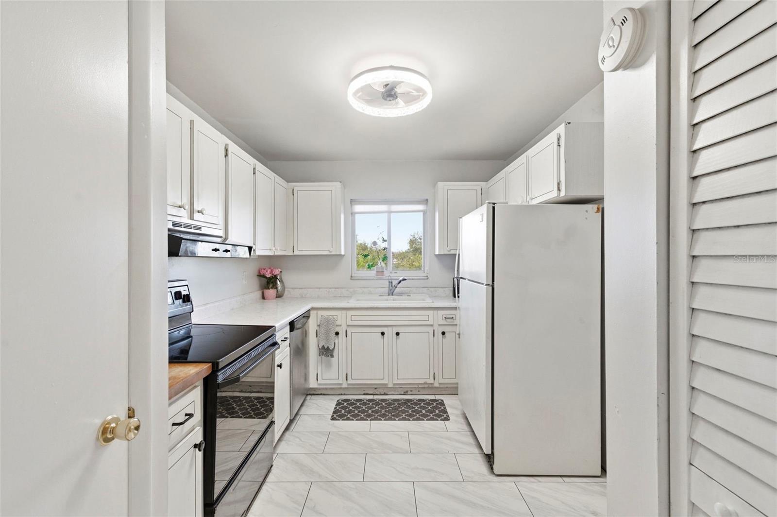 Kitchen with abundant natural light.