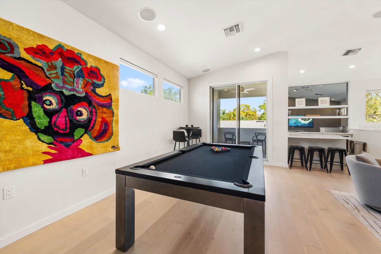 game room/media room could be made a mini in law suite .