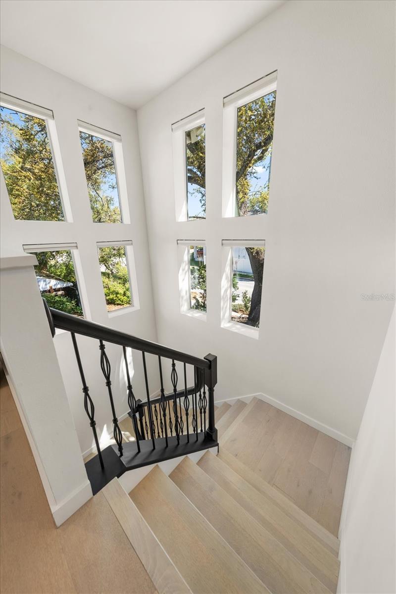 stairs going down to private retreat off of pool