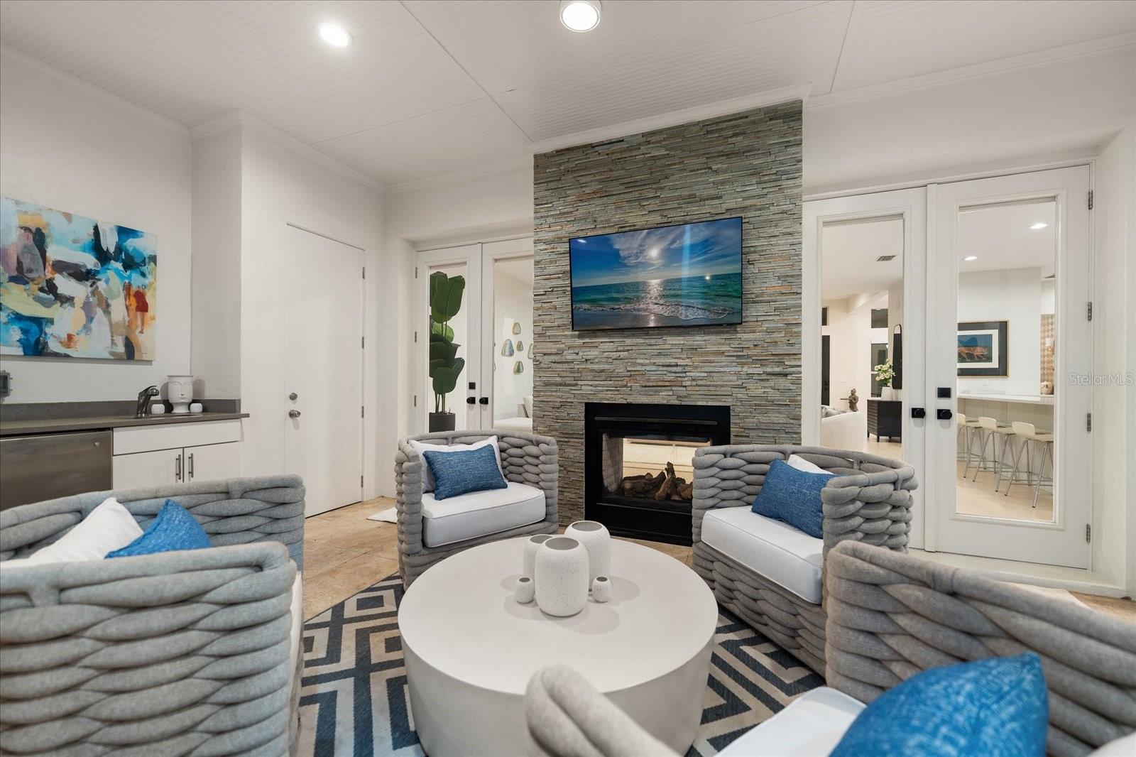 covered lanai with gas fireplace