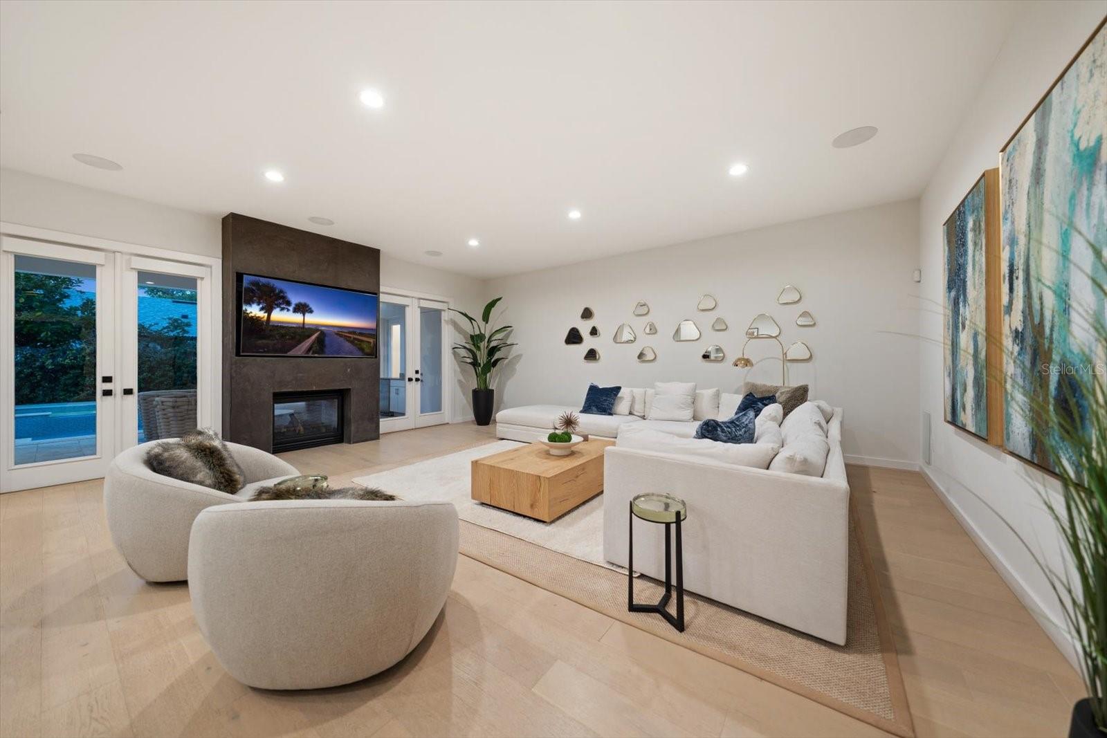 family room with double sided gas fireplace