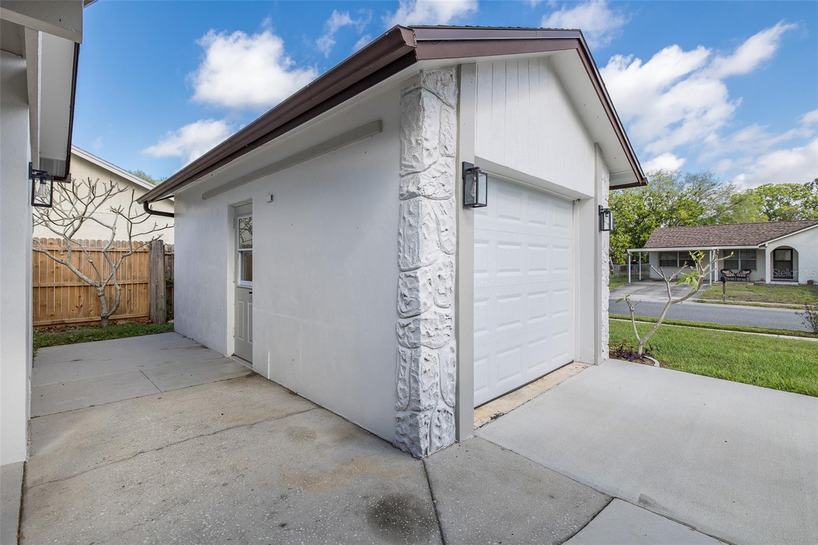 WALKWAY BETWEEN HOUSE AND GARAGE