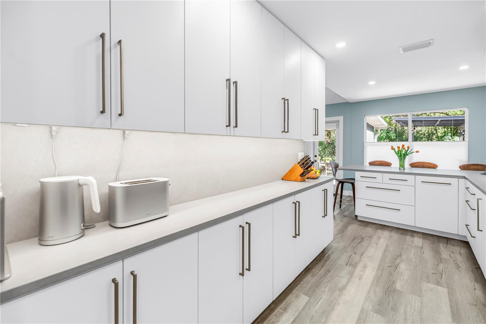 Storage, Storage, Storage...Storage.  Counters, Coffee, Tea, Artistically Lit.