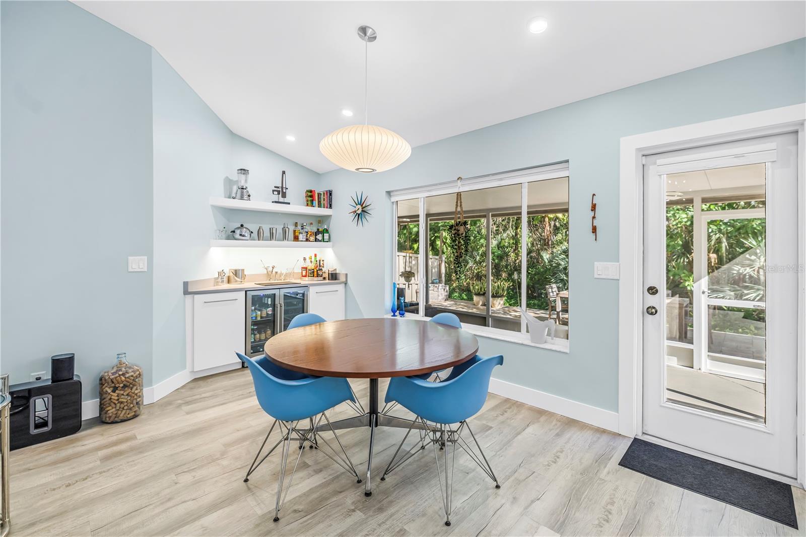 Expanded Living Space and Breakfast Area. Custom Bar and Beverage Center. Great View Too