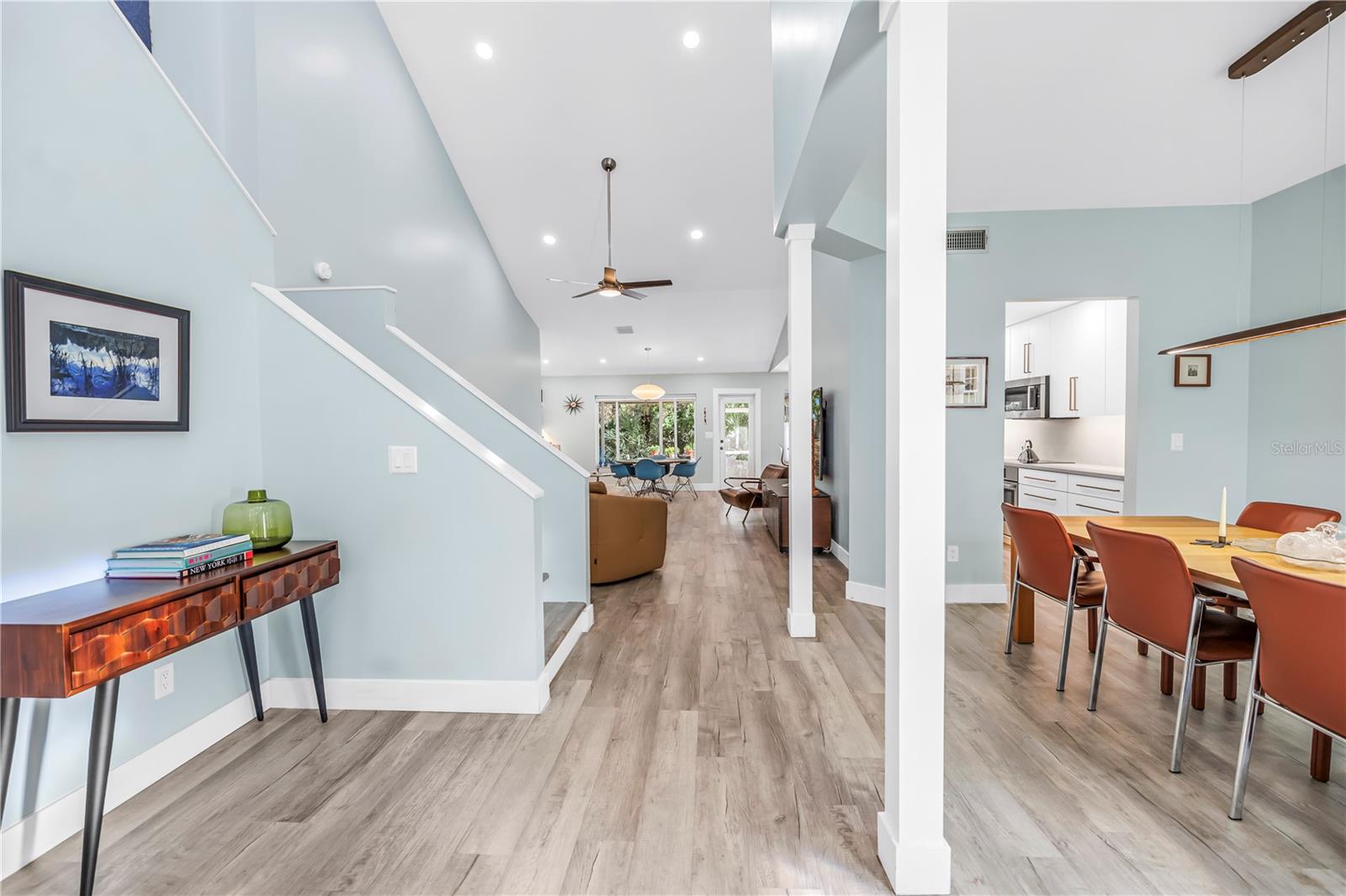 Super High Dramatic Ceilings and Walls Finished at a Level 5 Flatness.  Columns refinished in a geometric style.