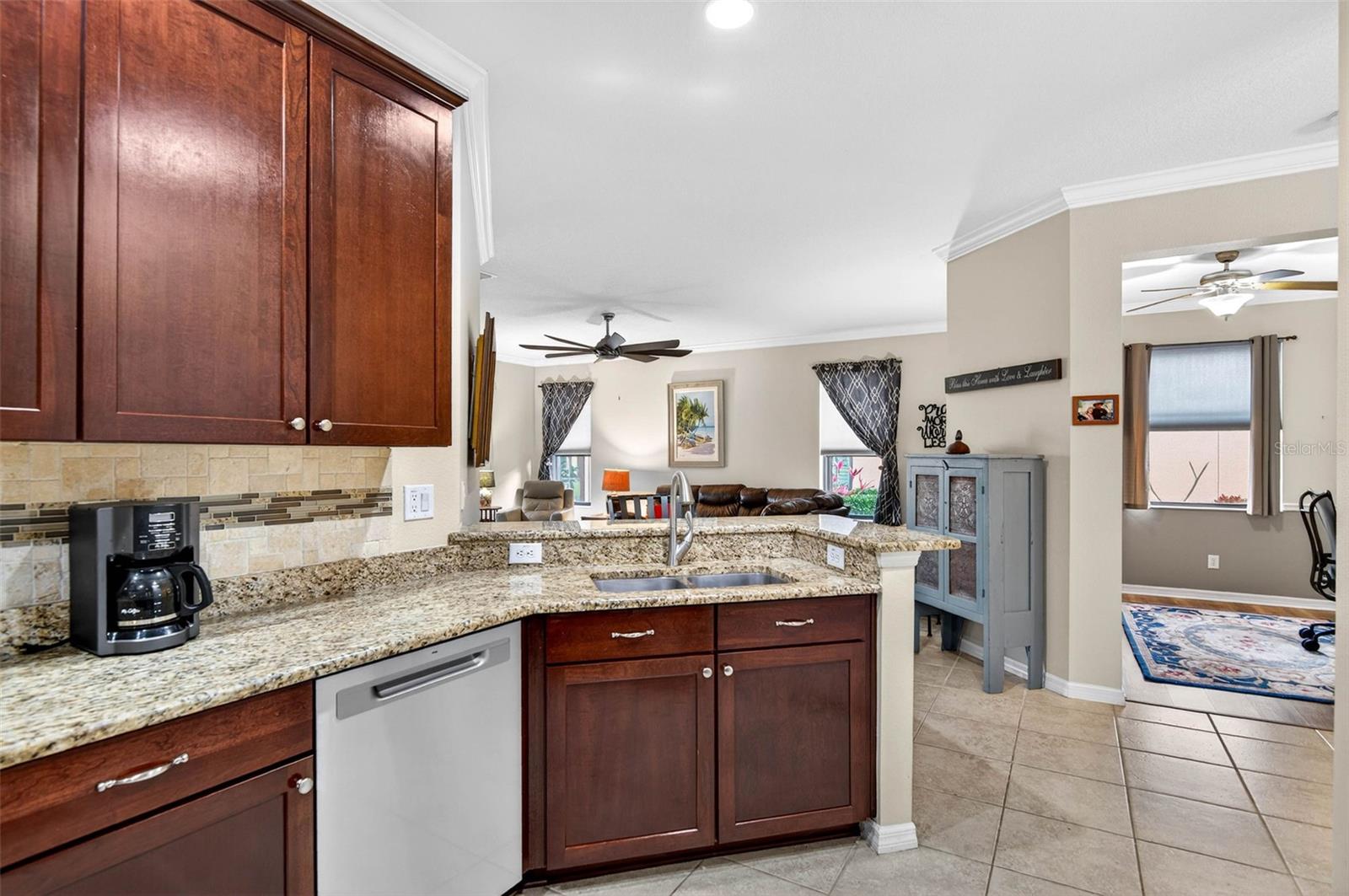Kithen overlooks the living area and office space.
