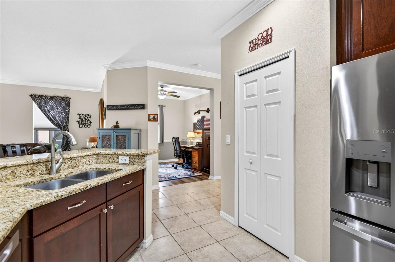 Closet pantry. Crown molding throughout main living area and kitchen.