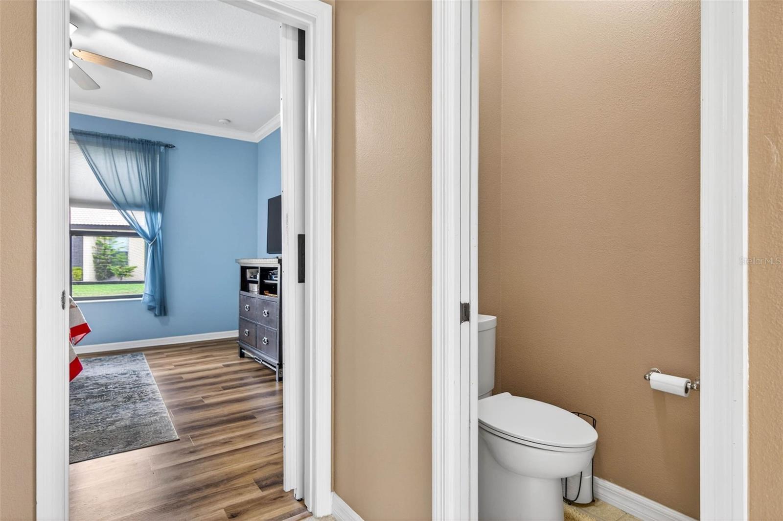 Primary en suite bathroom with private water closet.