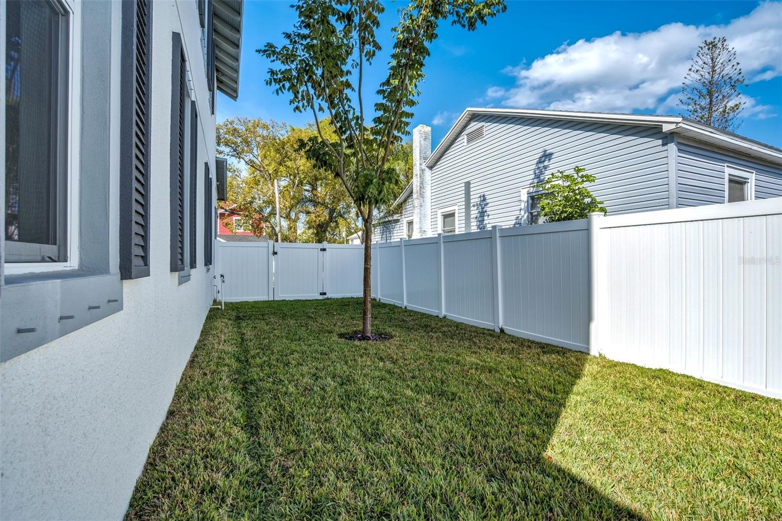 Side Yard With Vinyl Fencing