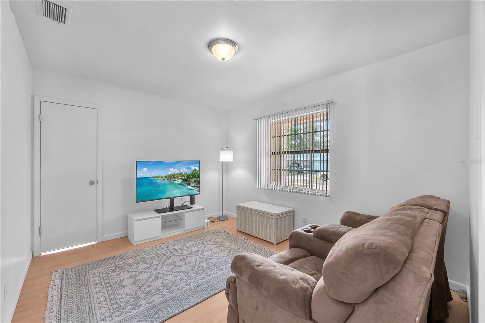 This room has direct access to the converted garage bonus room and could be a two room in-law suite including a full bathroom separate entrance from utility room.