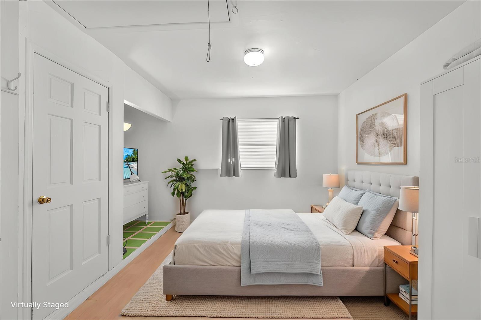 A converted garage adds incredible versatility, now serving as a private bonus suite complete with its own full bathroom—perfect for guests, a home office, in-law space, or even potential rental income.