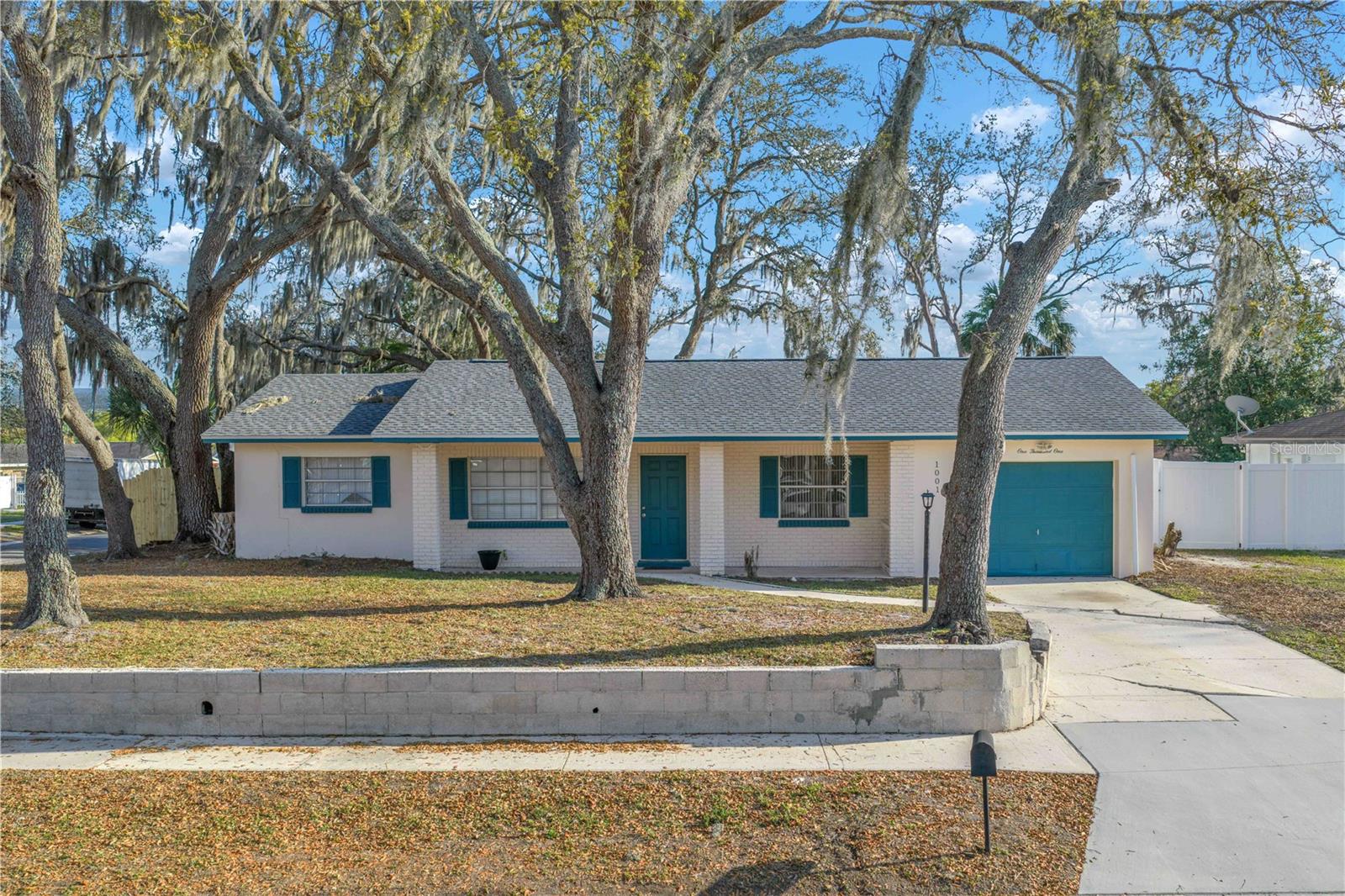 move-in ready home located on an oversized corner lot in the non-deed-restricted community of Southwood Hills in Brandon.  NO HOA or CDD