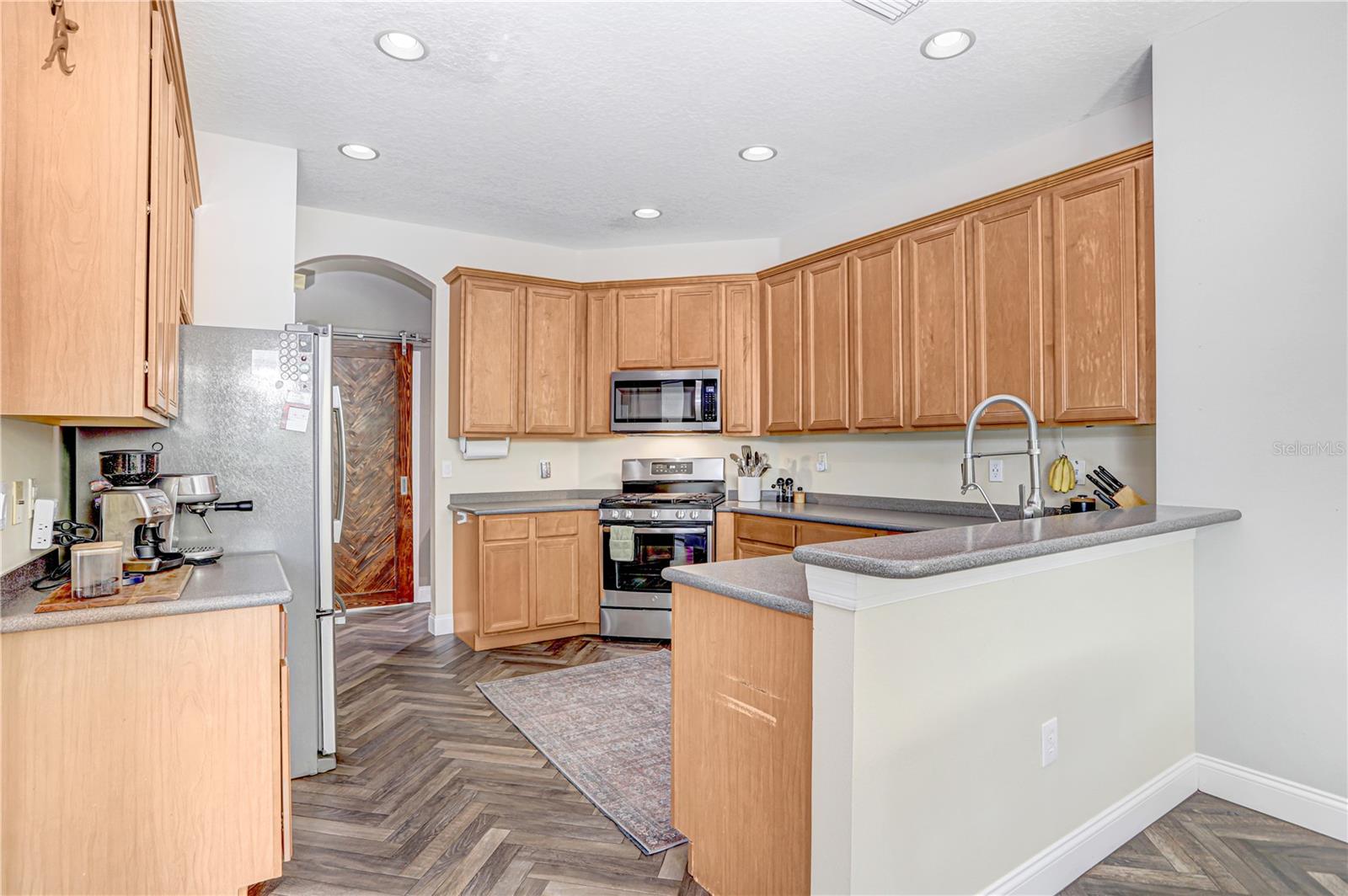 SS appliances and the first of two pantries