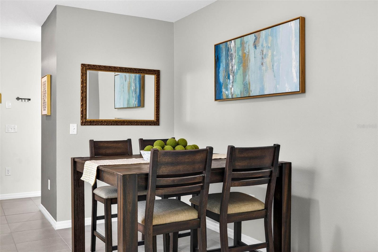 This dining area can expand to fit a table of 6