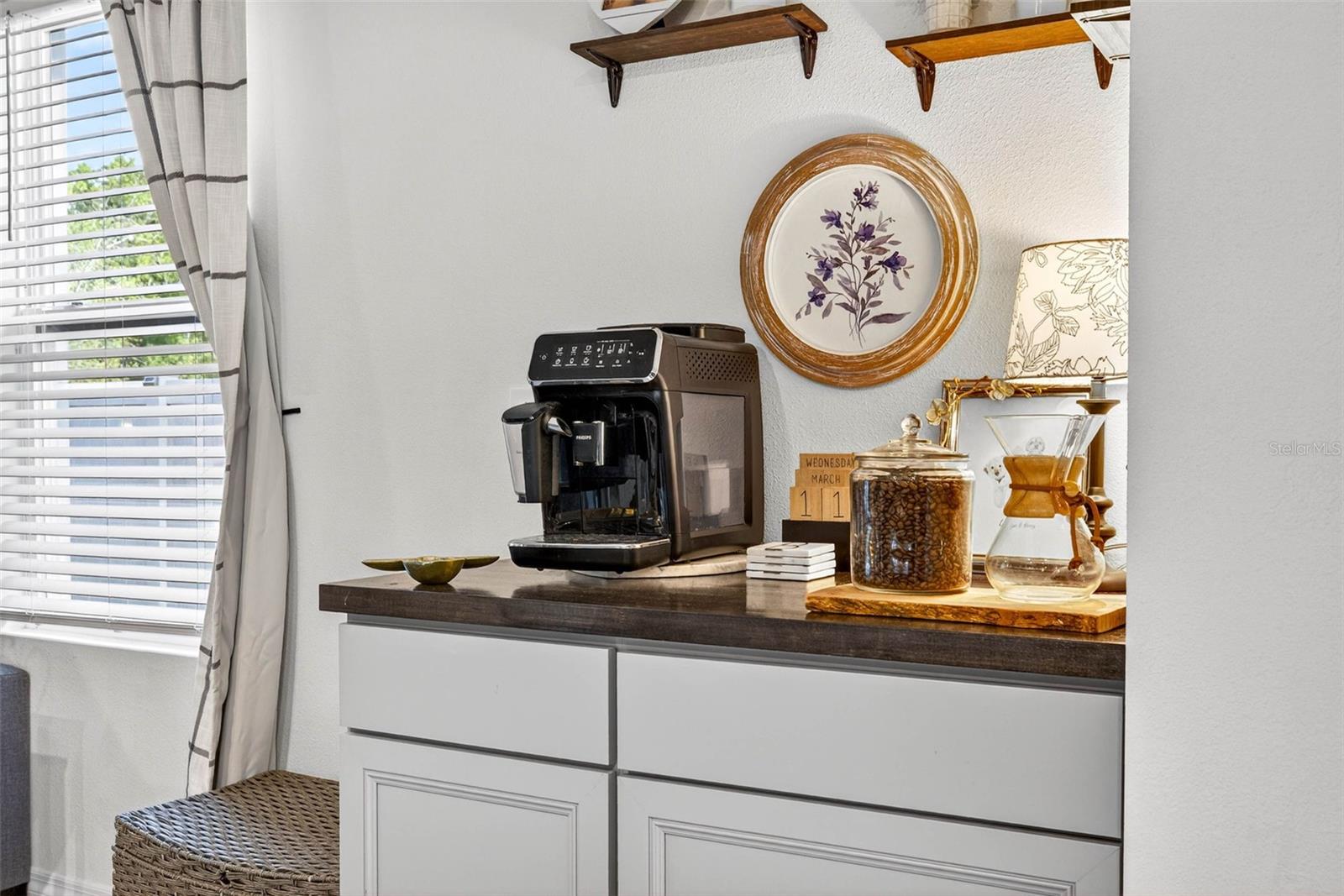 Added coffee bar with additional cabinetry just off the kitchen and pantry.