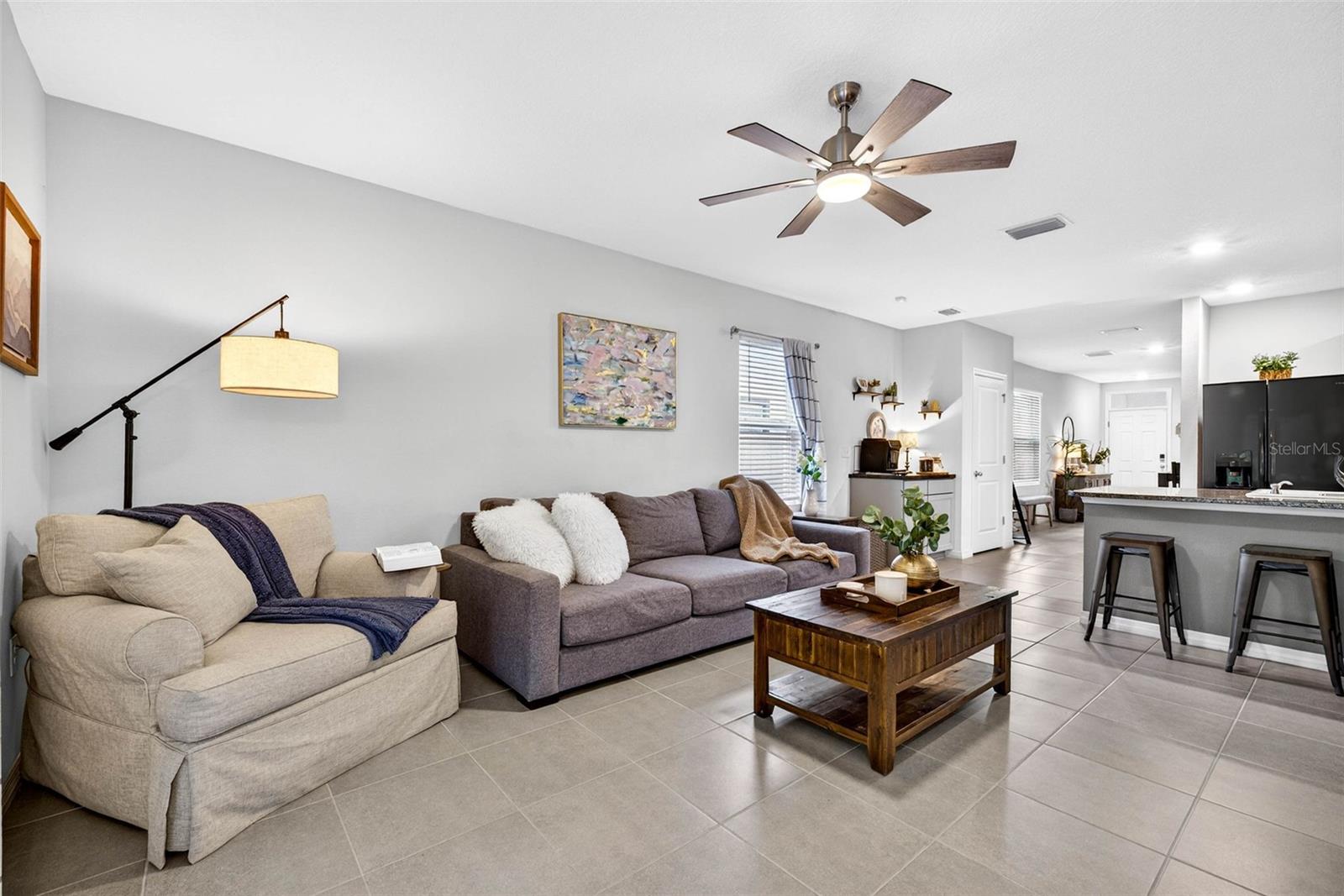 Reading nook in the corner, ample seating space.