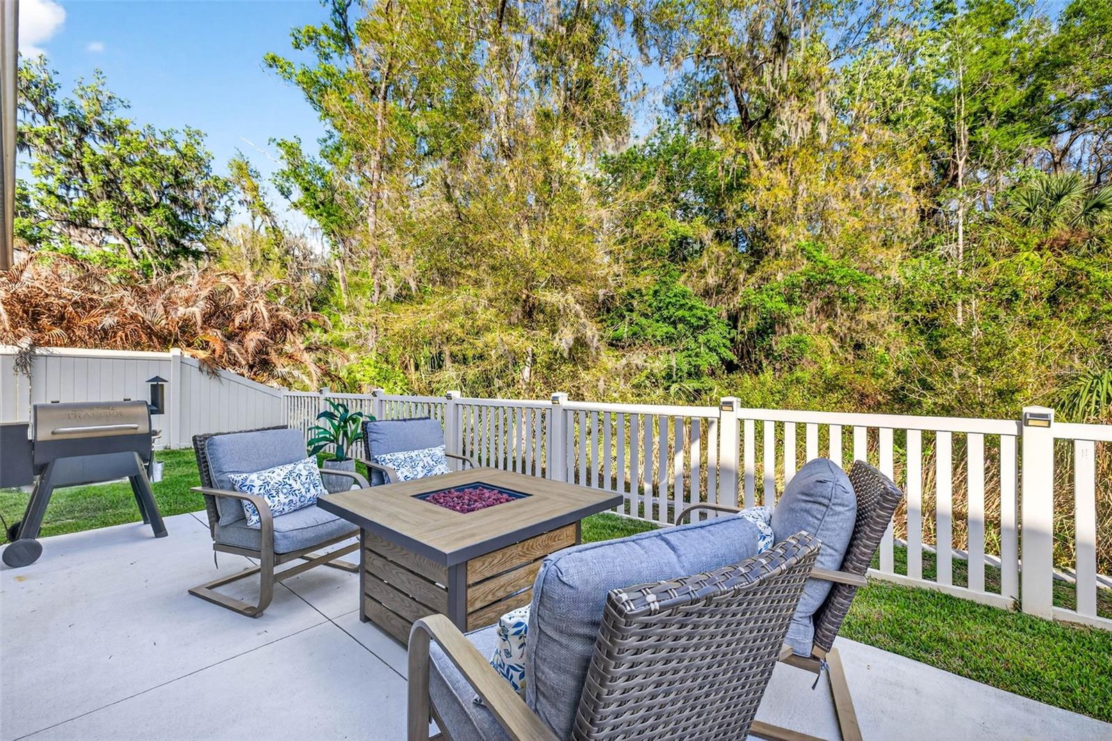 Outdoor patio area + fenced yard.