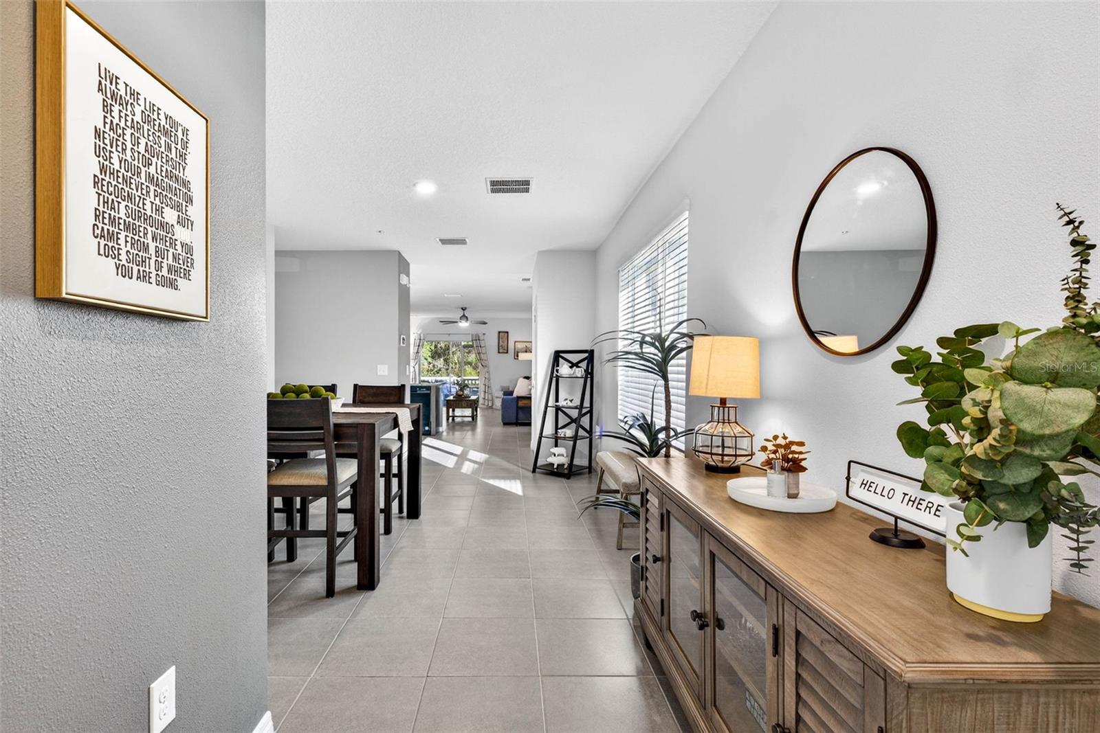 Enter your new home with a welcoming entryway and tall ceilings.