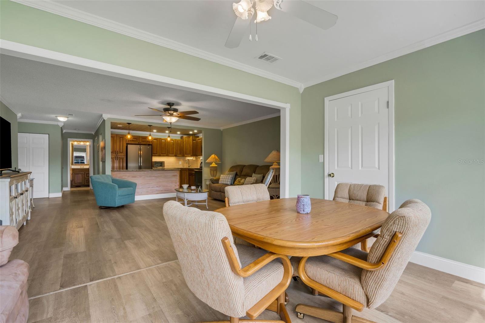 Florida Room Looking to Living Room and Kitchen