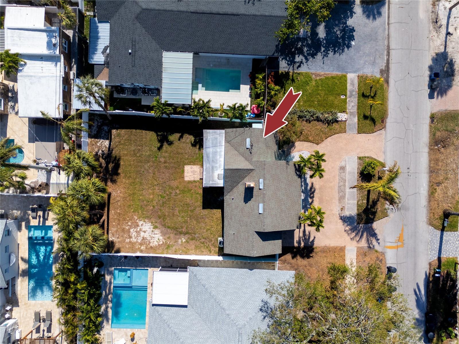 Large fenced in lot with privacy fencing and parking for 2-3 vehicles, plus one car garage. Room for a pool!