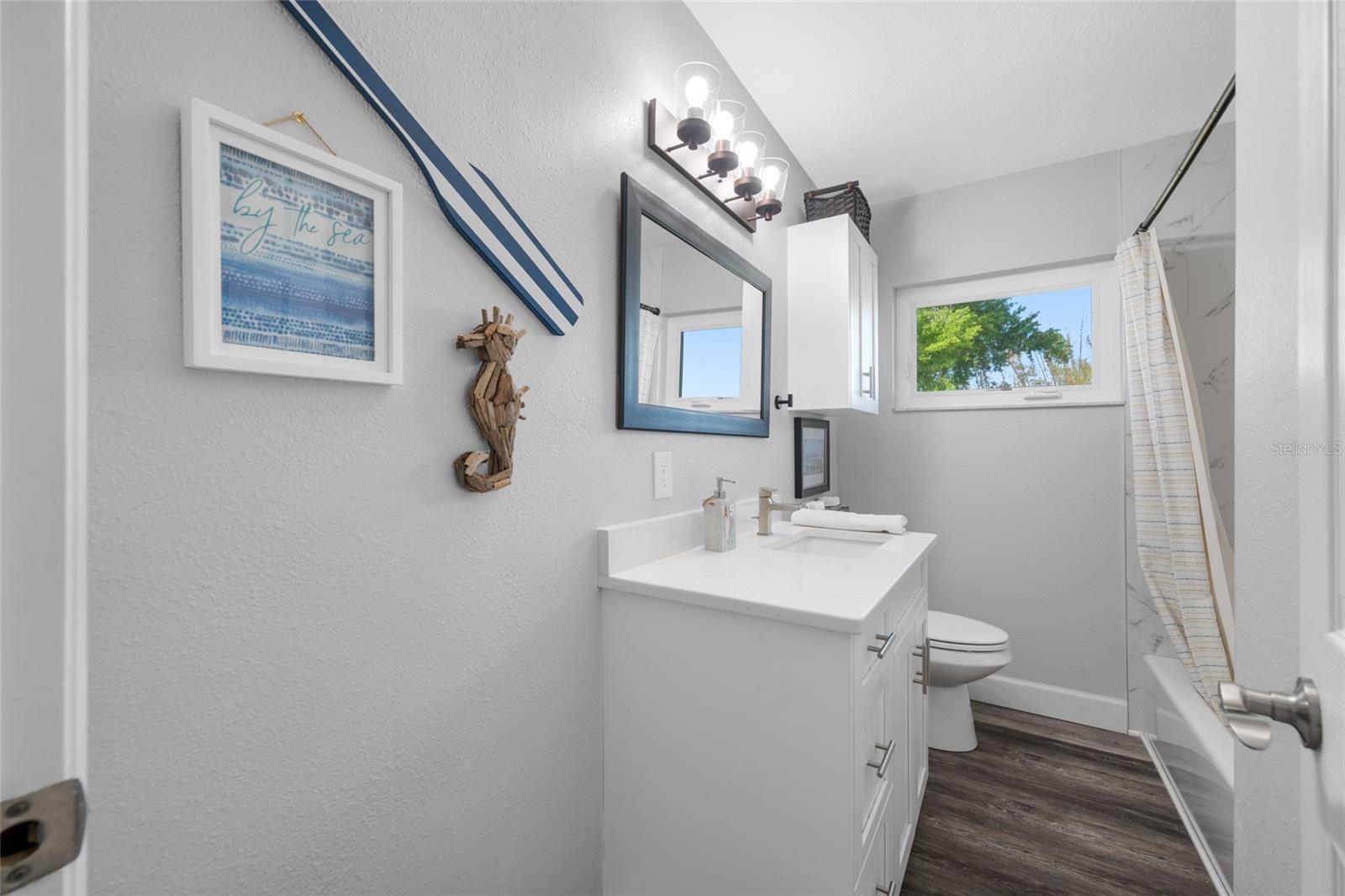 Hall bathroom with bathtub & shower