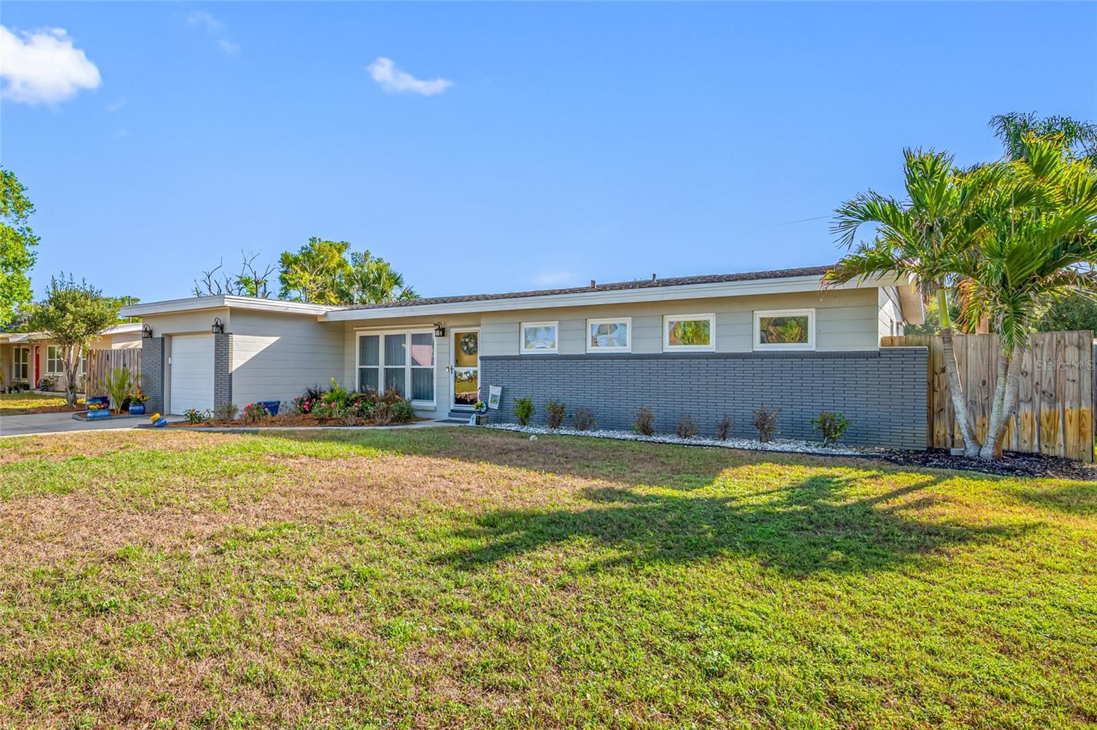 8335 Robin Rd, Seminole, FL 33777 - Front lawn, West Side