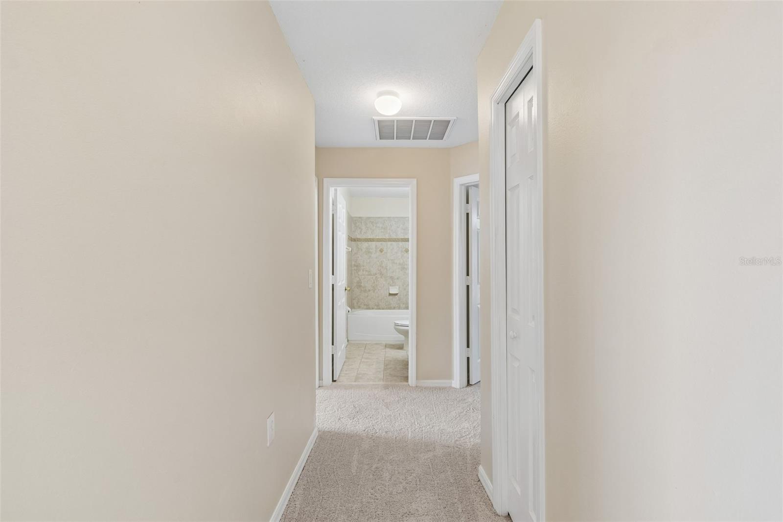 Hallway to secondary bedrooms