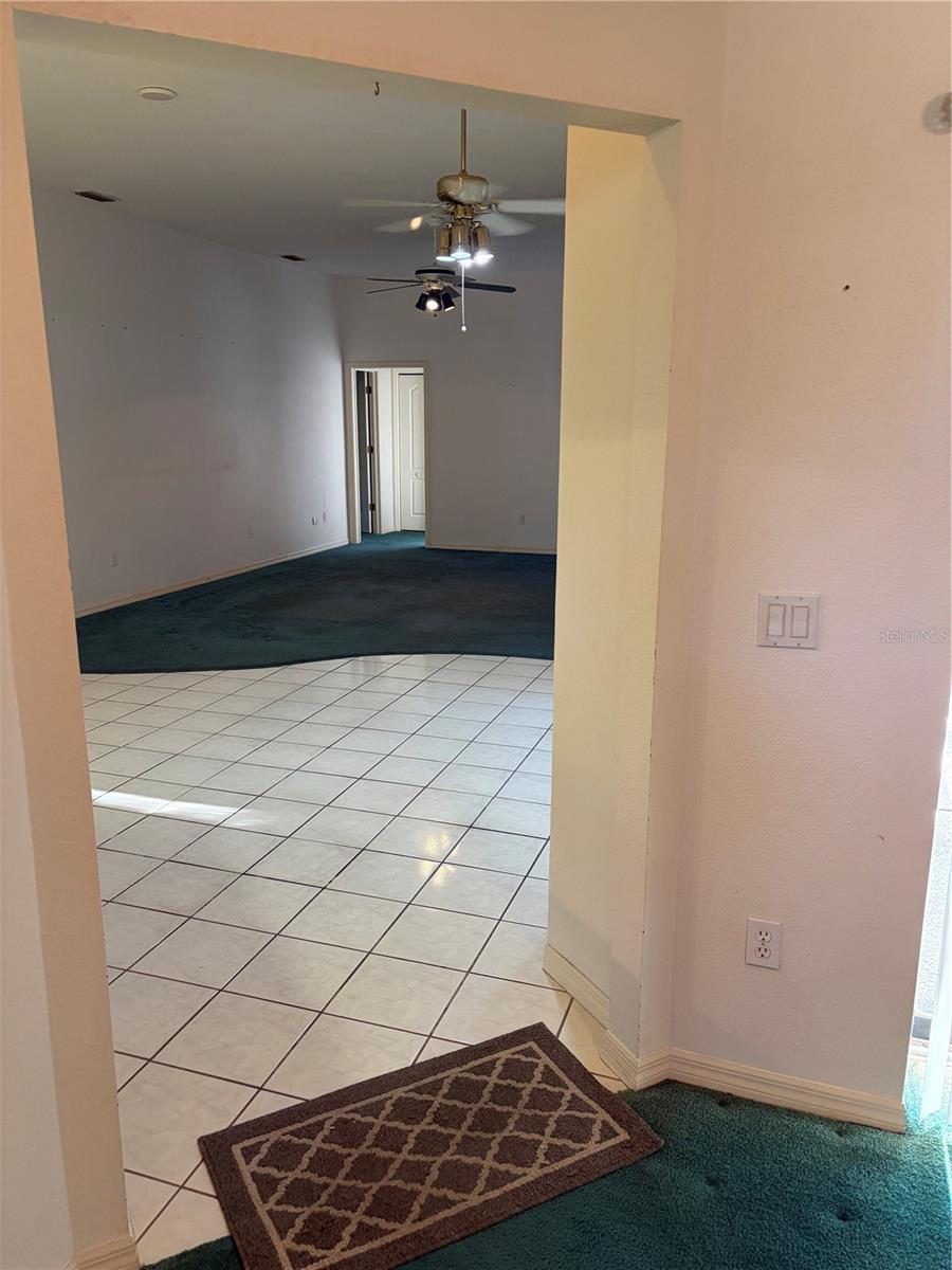 entrance from living room into kitchen and family room