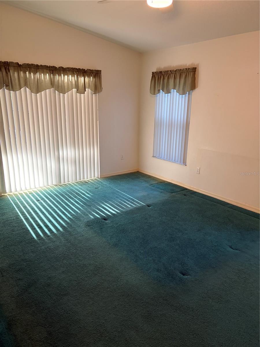 master bedroom and entrance also to pool area