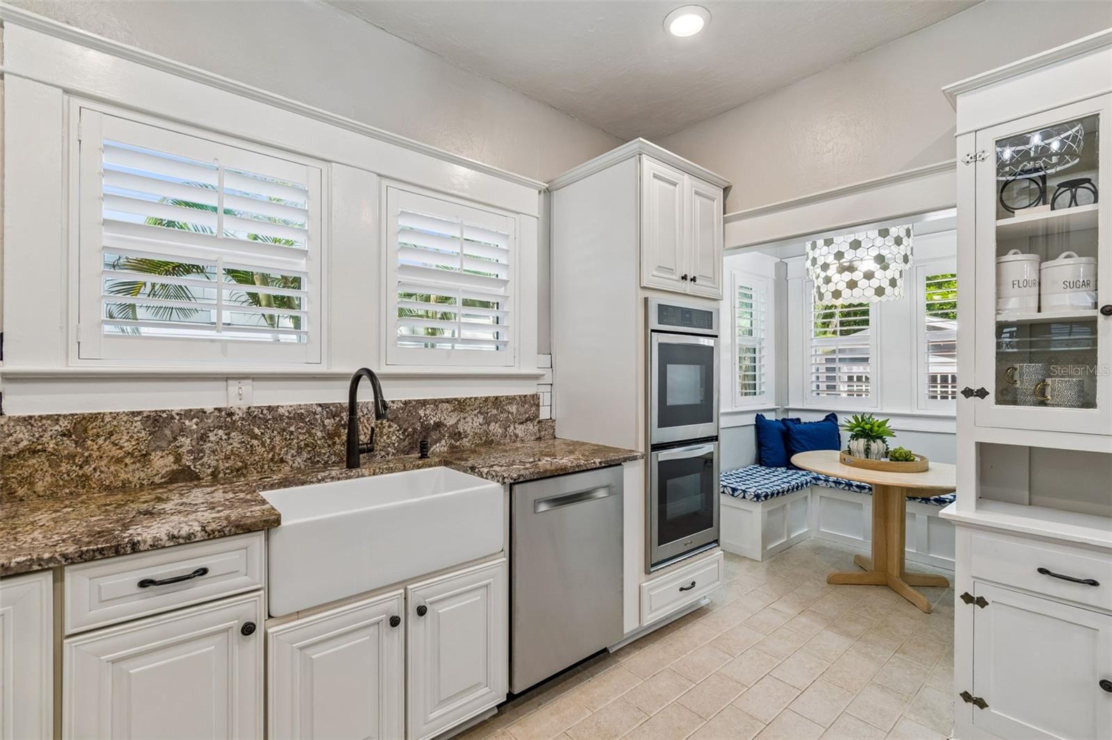 Very roomy kicthen with plenty of cabinets and modern appliances.