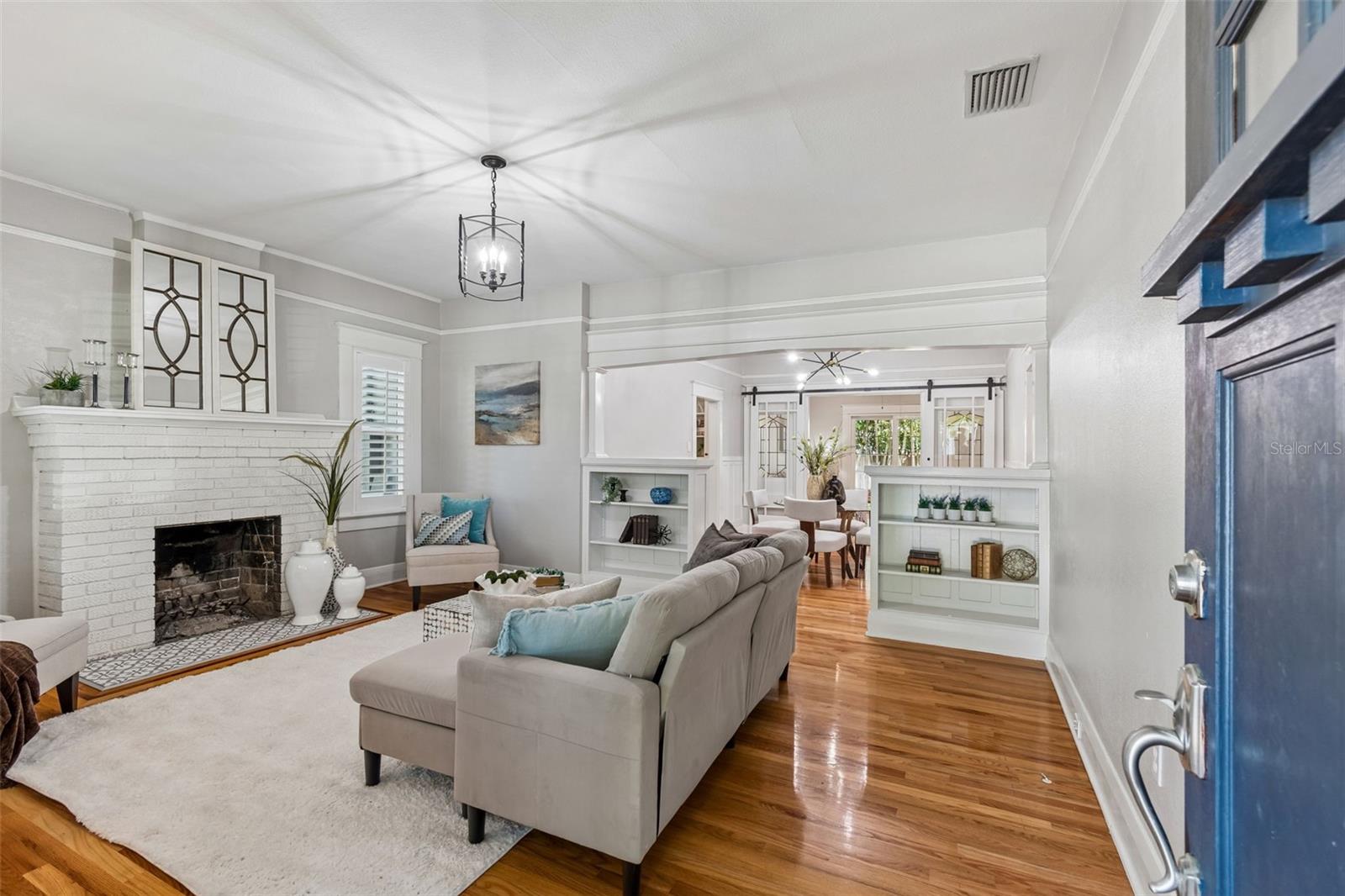 Living room with a wood burning fireplace is magical!